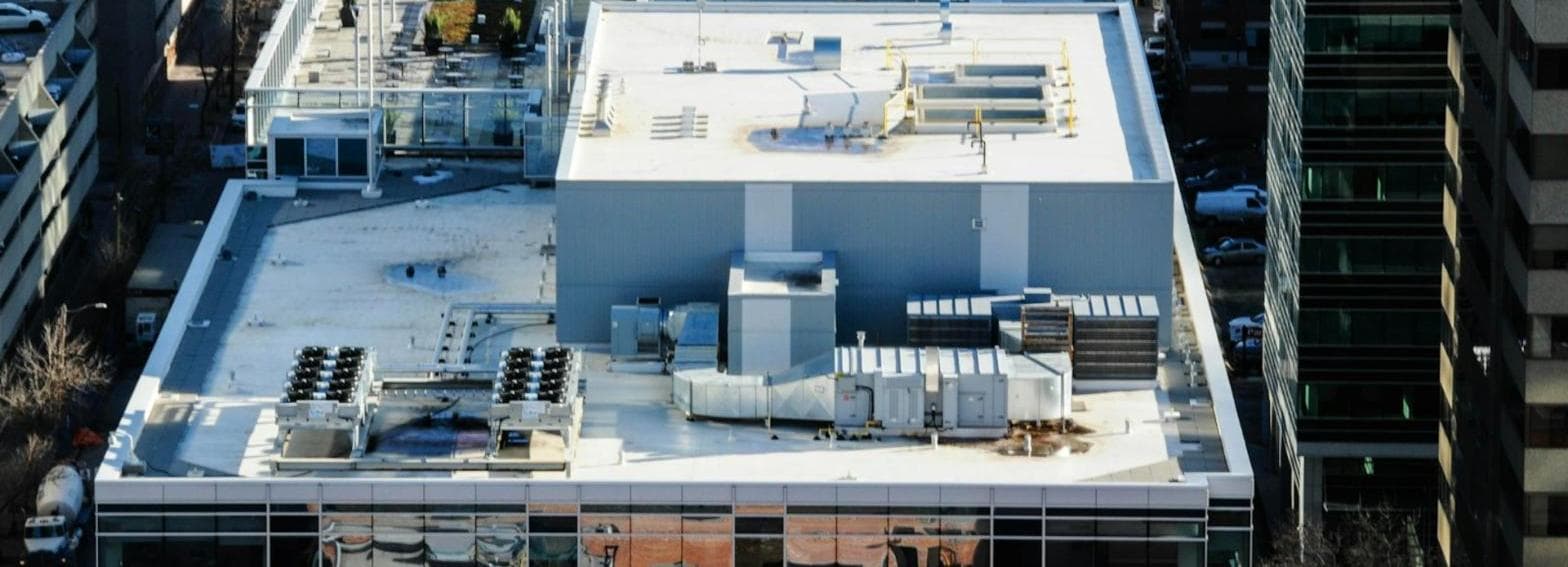 Aerial view of rooftop mechanical equipment on a commercial building